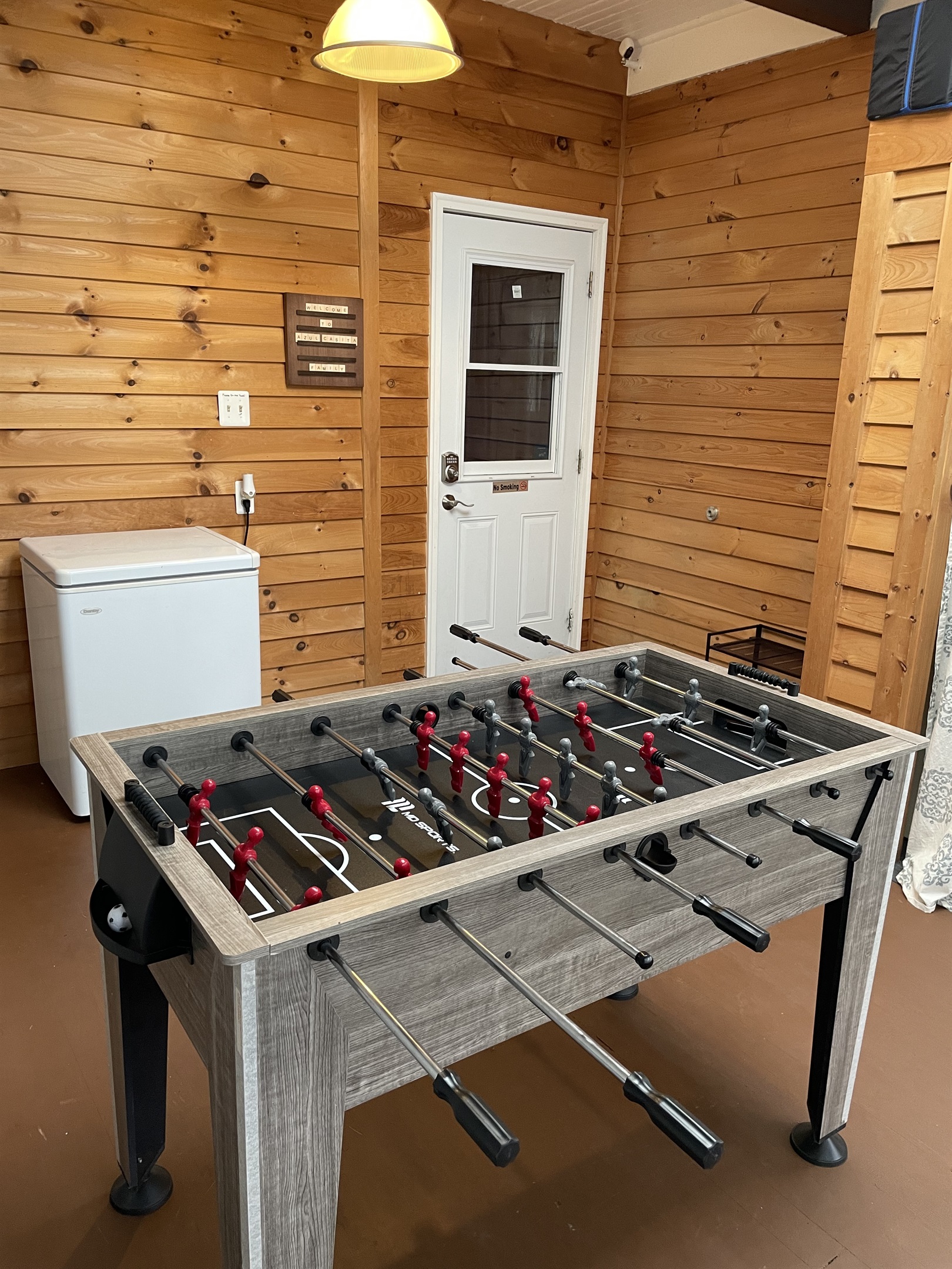 Foosball in entryway gameroom
