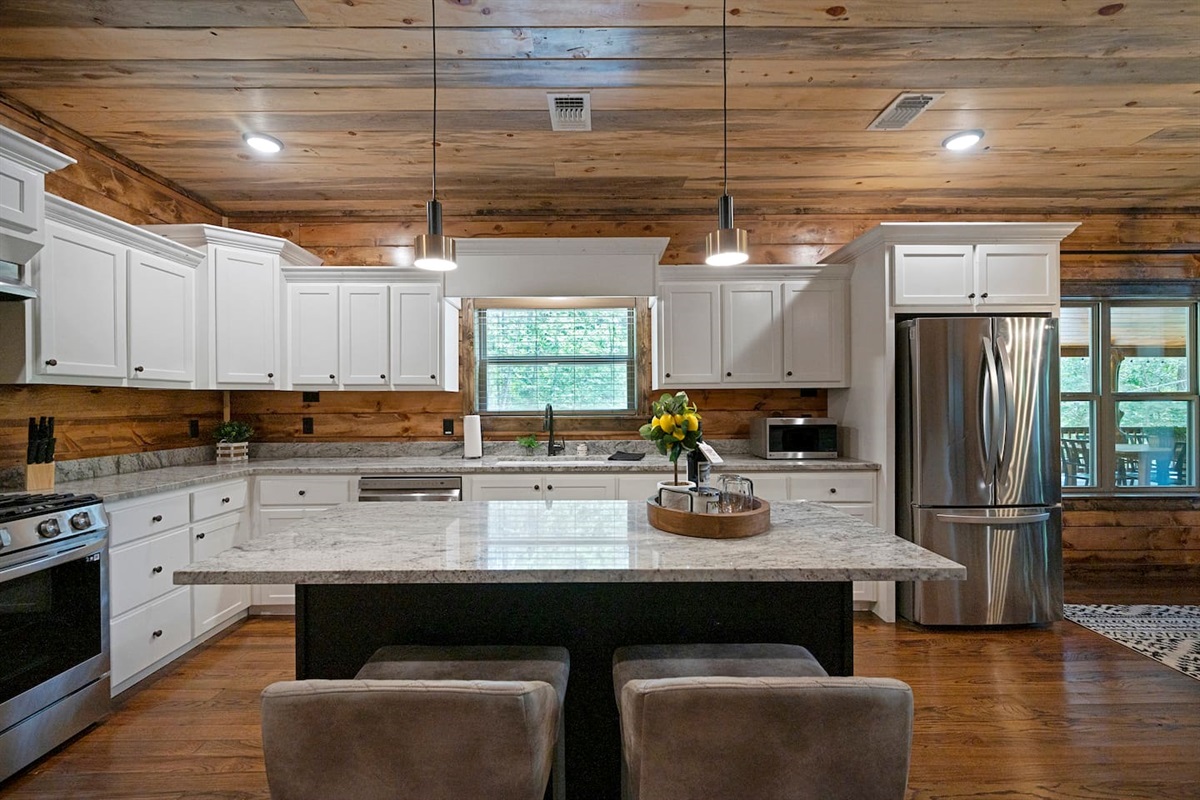 Modern appliances and ample counter space make meal prep easy and fun.