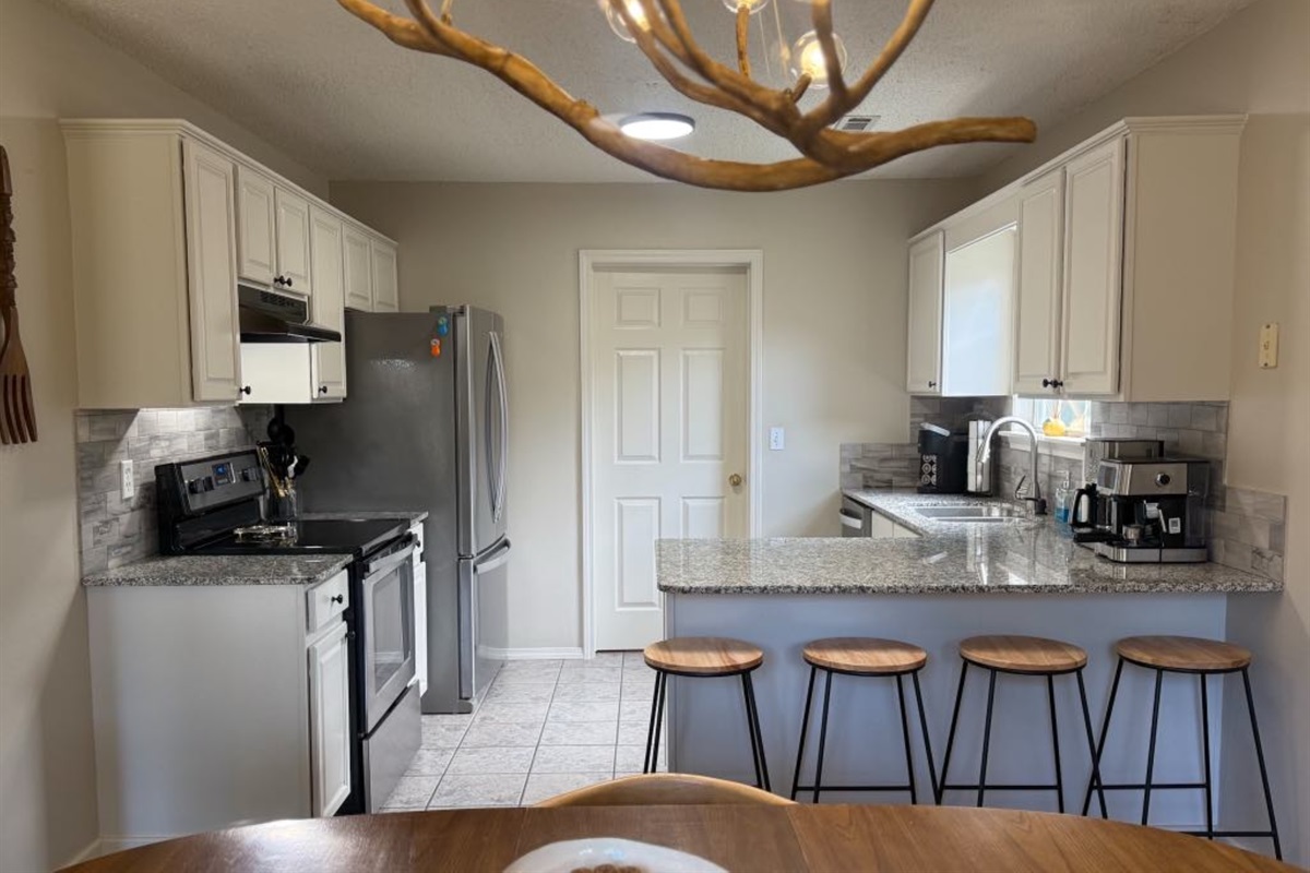 DINE: Enjoy a home-cooked meal in the open dining space, perfect for reconnecting.