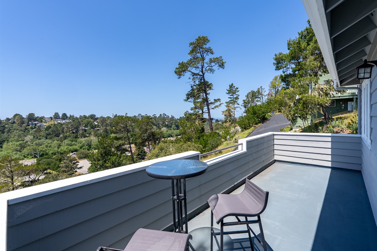 Enjoy your morning coffee on this breezy balcony.