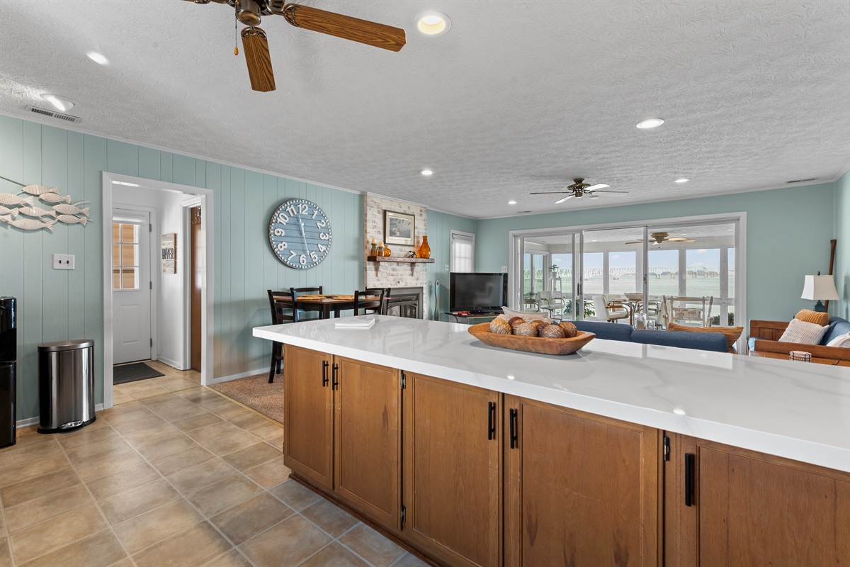 Living Room: Bright and airy space with stylish decor and serene water views—perfect for relaxation!