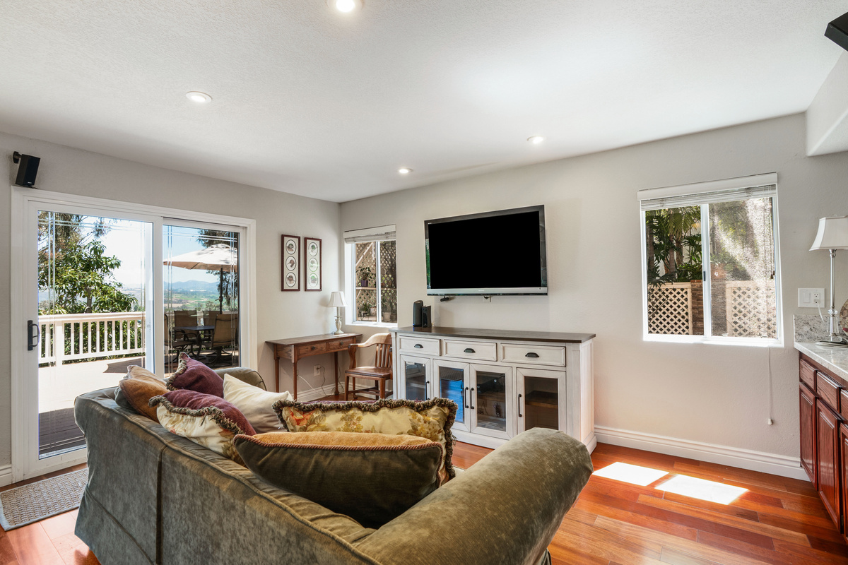 Family Room with Smart TV and Door to Patio 