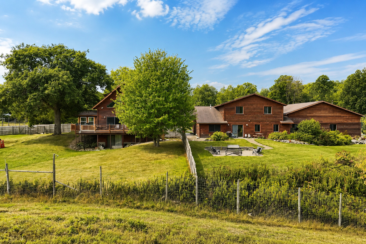 The House and Lodge next to each other show off the impressive size and outdoor space that makes this property truly one of a kind!