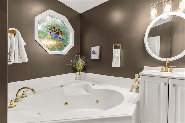 Ensuite bathroom attached to BR3 with soaker tub and shower
