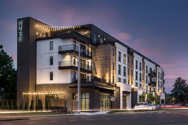 Exterior: Experience modern charm in Nashville with stylish design and vibrant nighttime ambiance!