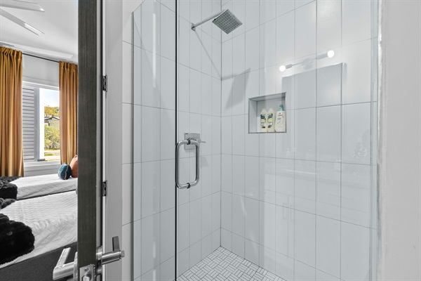Spa-Like Bathroom: Enjoy a refreshing shower with modern fixtures and stylish tiles!