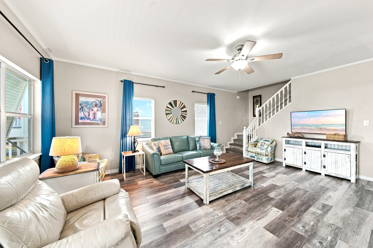 Bright, comfortable living area with plenty of room to gather after a day on the water or at the beach.