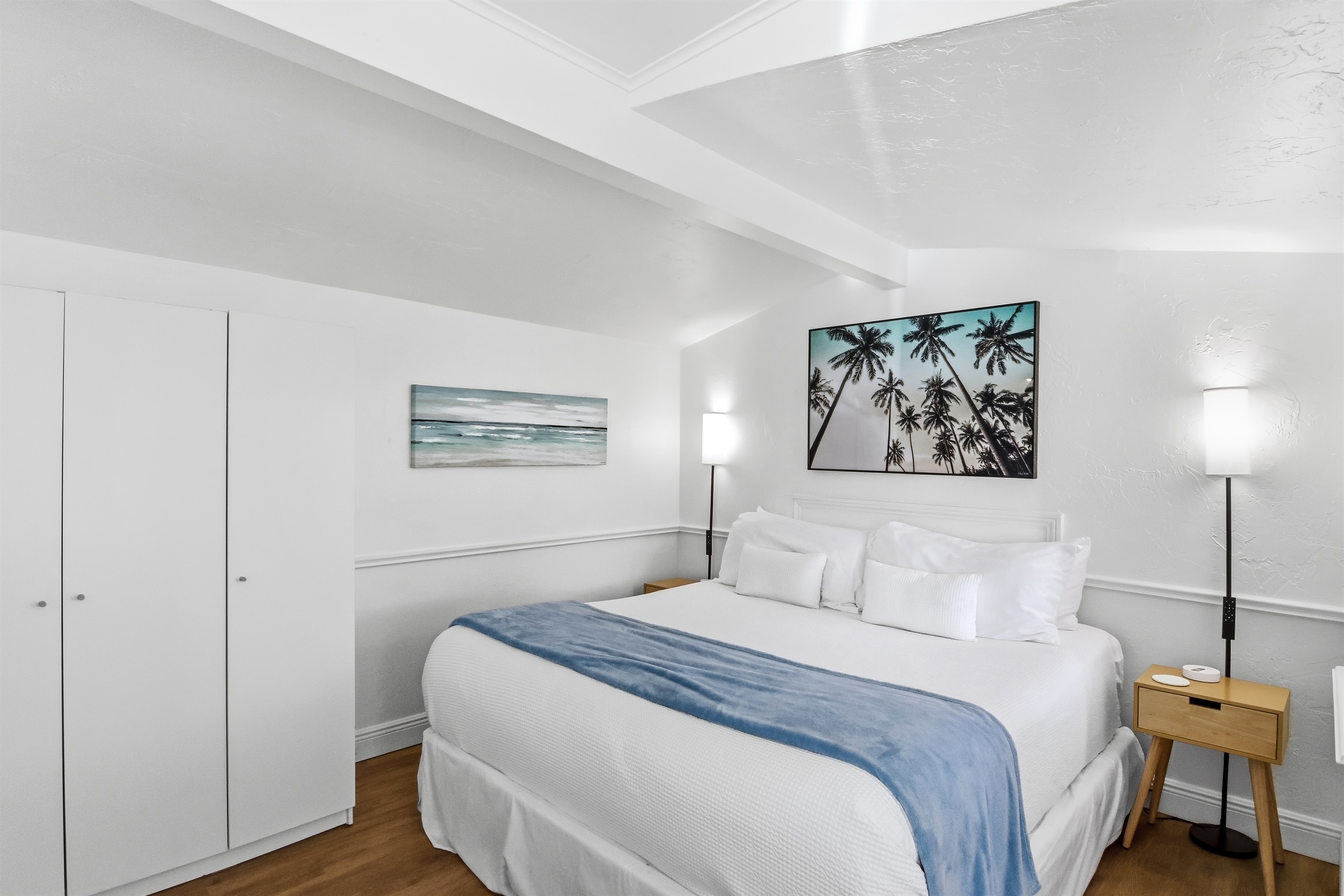 Plush king bed, 100% cotton linens, ambient lighting