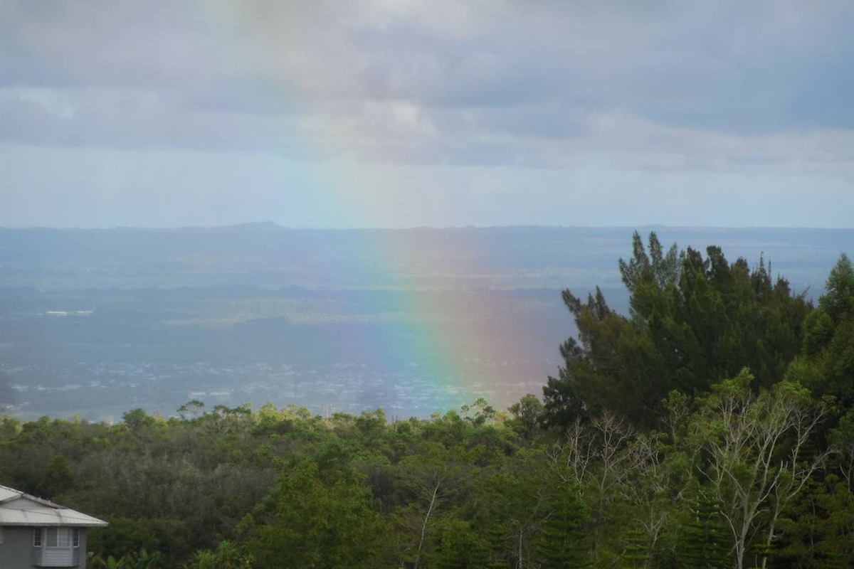 An afternoon rainbow overlooking Puna, the home of Pele in Kilauea