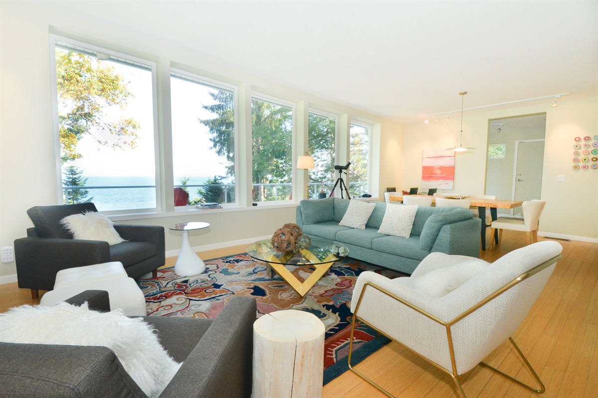 Spacious oceanview living room with cozy touches