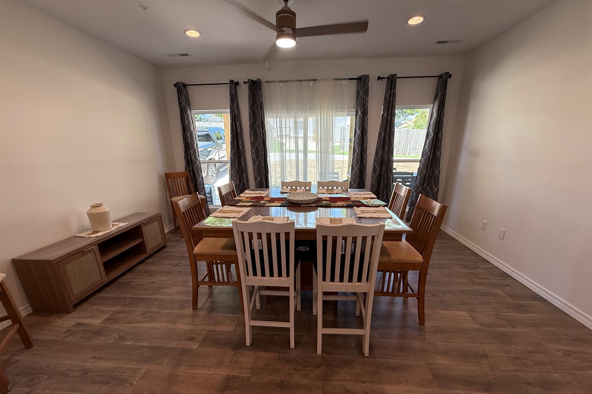 Dining room with sliding door to patio with more dining space