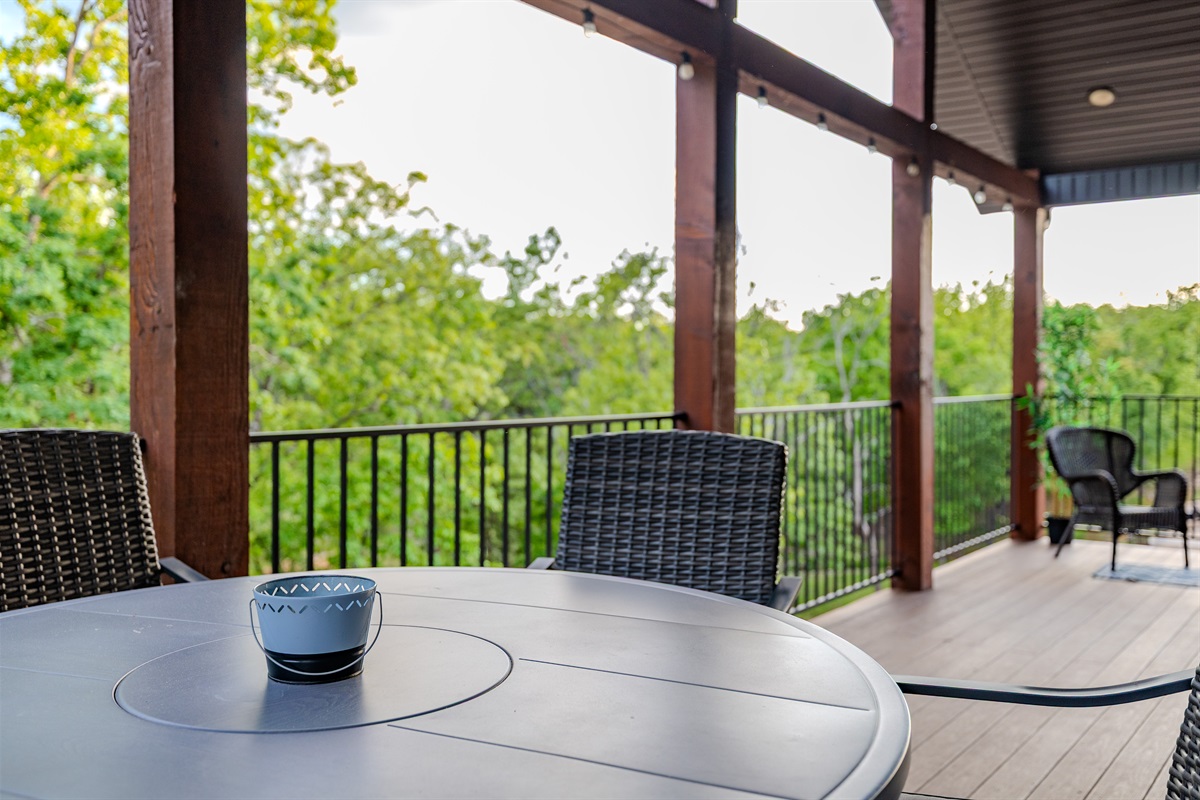 Relaxing deck with wooded views