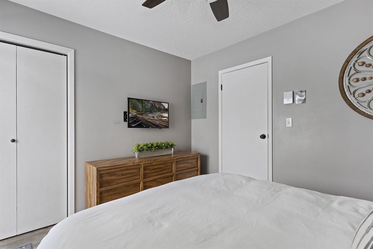 Relax in this peaceful bedroom retreat with TV entertainment and plenty of storage for extended stays.