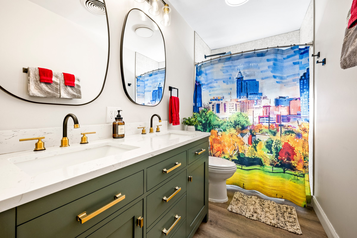 The Raleigh bathroom includes a spacious vanity and thoughtful extras for guests.