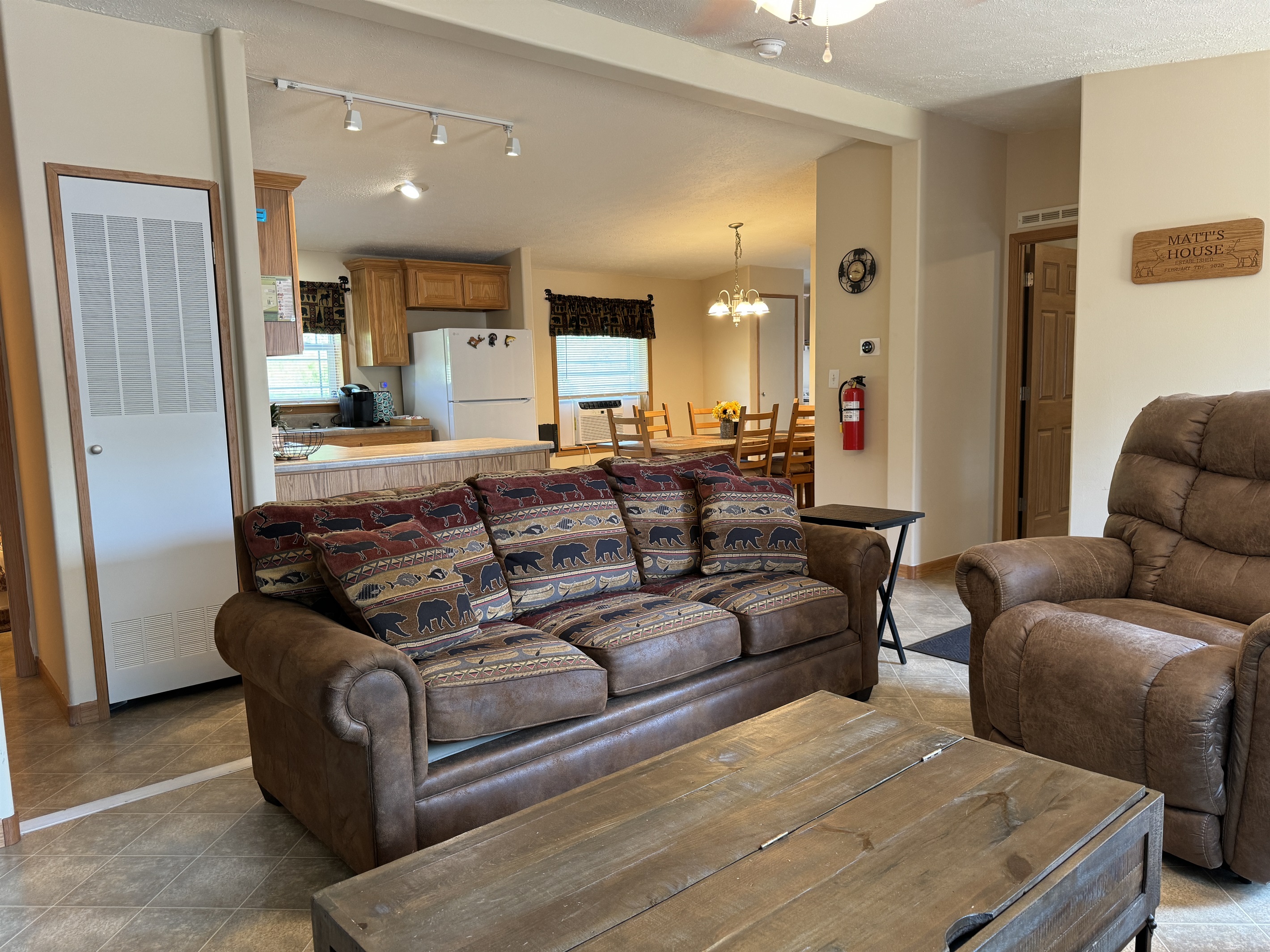 Living room with Eat-in kitchen beyond
