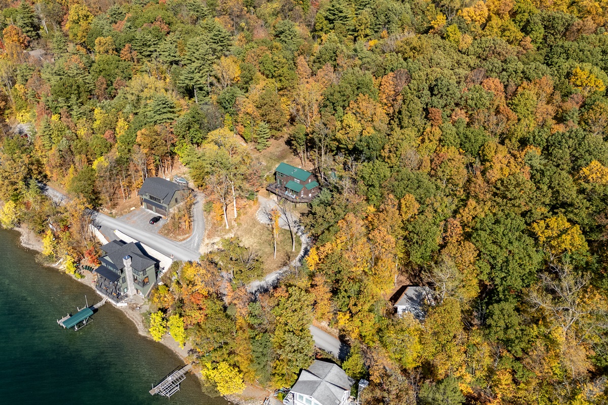 Another aerial shot showing the cabin’s peaceful location and quick access to water.