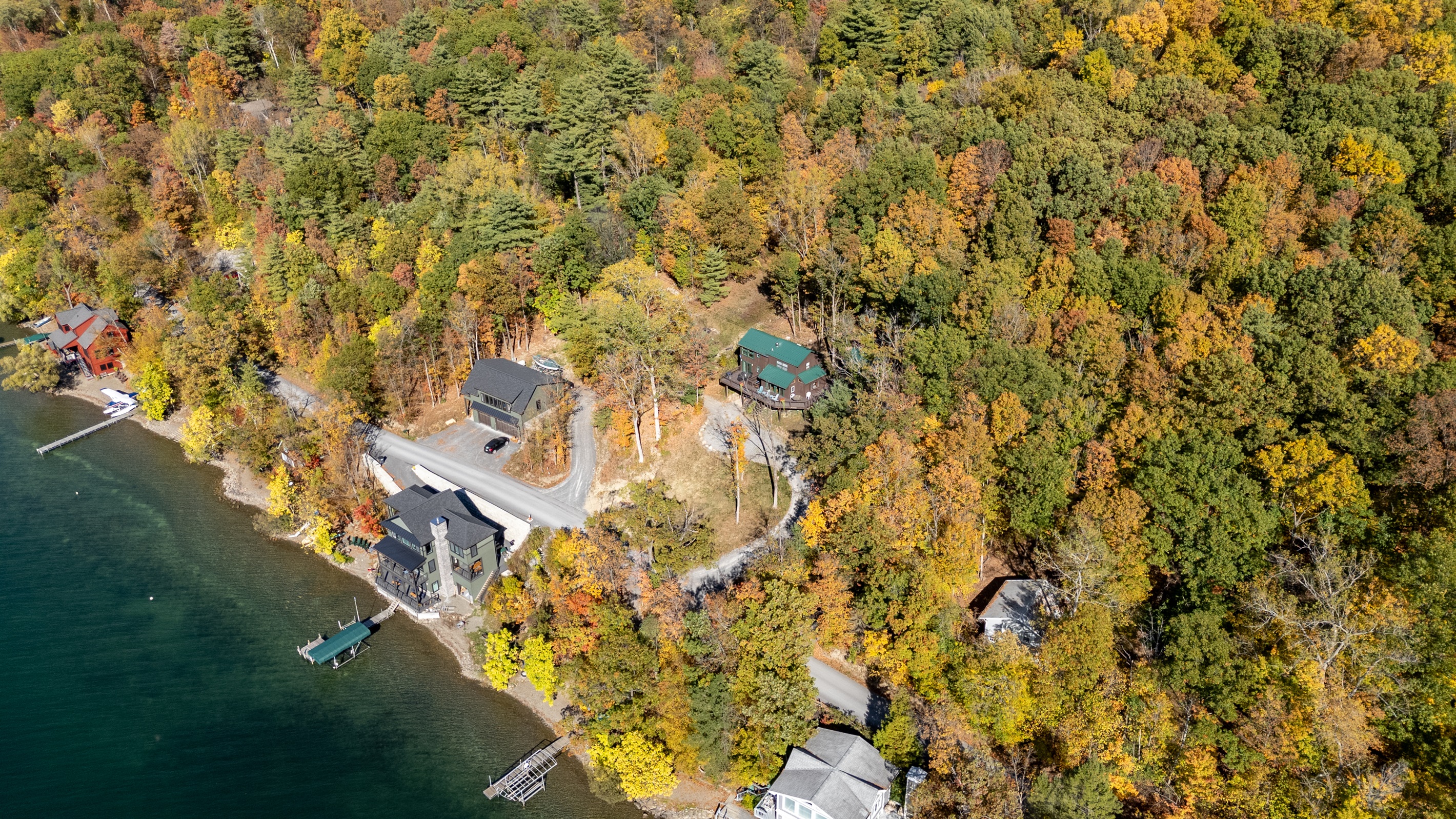 Another aerial shot showing the cabin’s peaceful location and quick access to water.