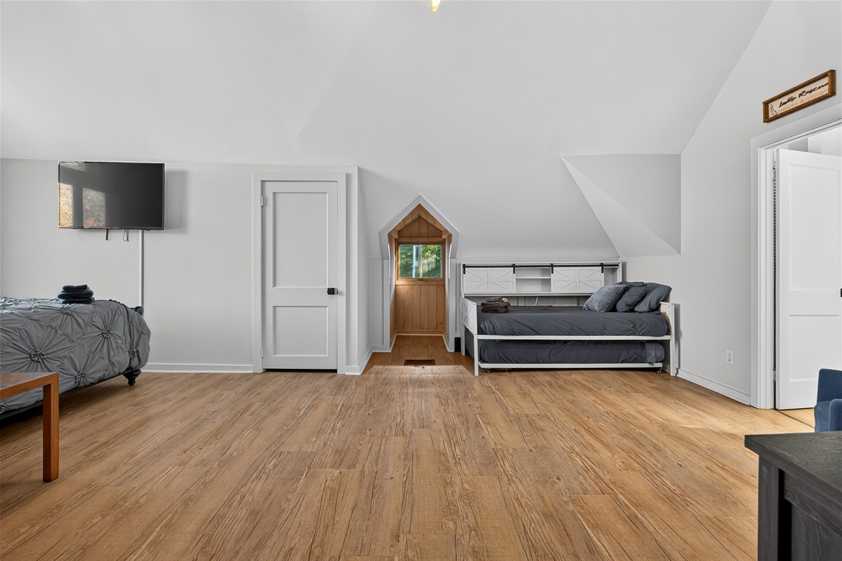 The 2nd fl bedroom has a twin bed + trundle for the little ones :)