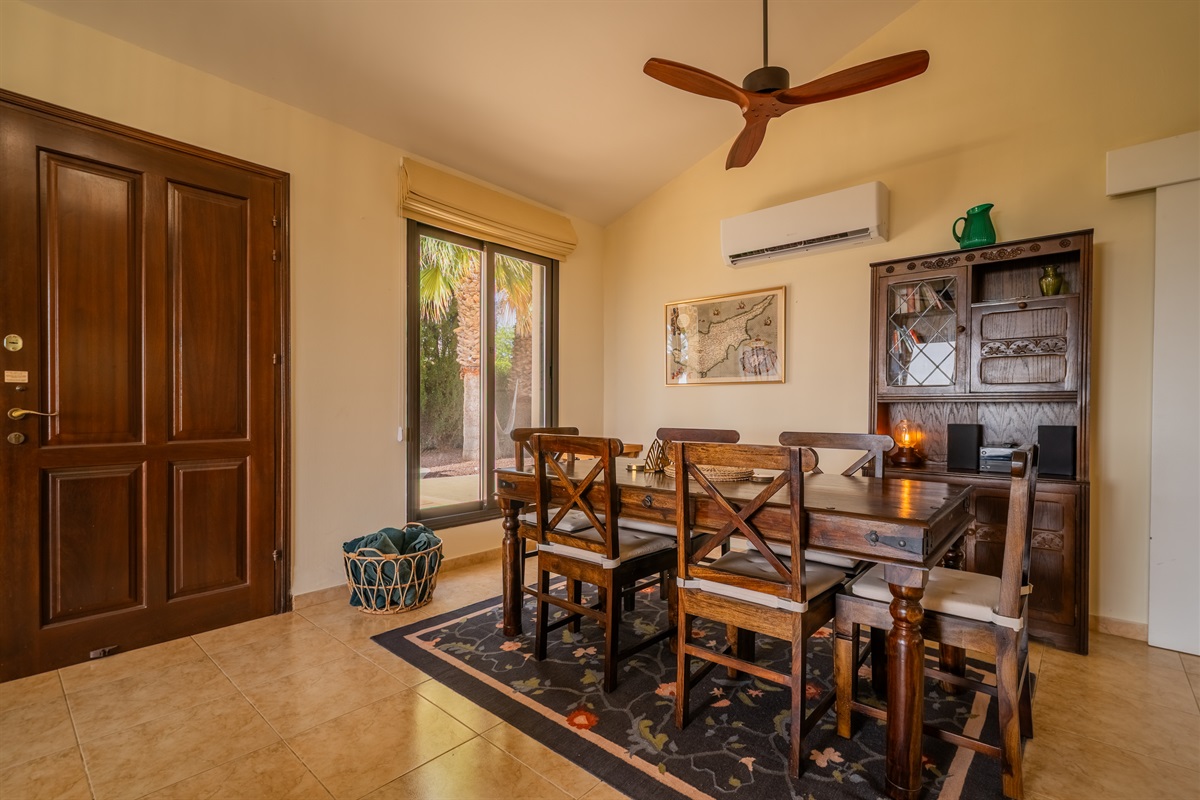 Dining area with a large table that comfortably seats six. Ceiling fan as well as dedicated AC/heating unit. You will also find a bluetooth enabled stereo here.