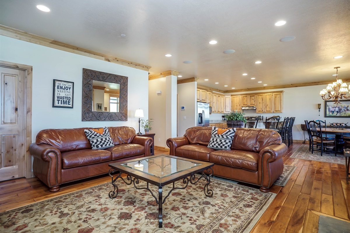 Bright and airy living space flowing seamlessly into the kitchen and dining area.