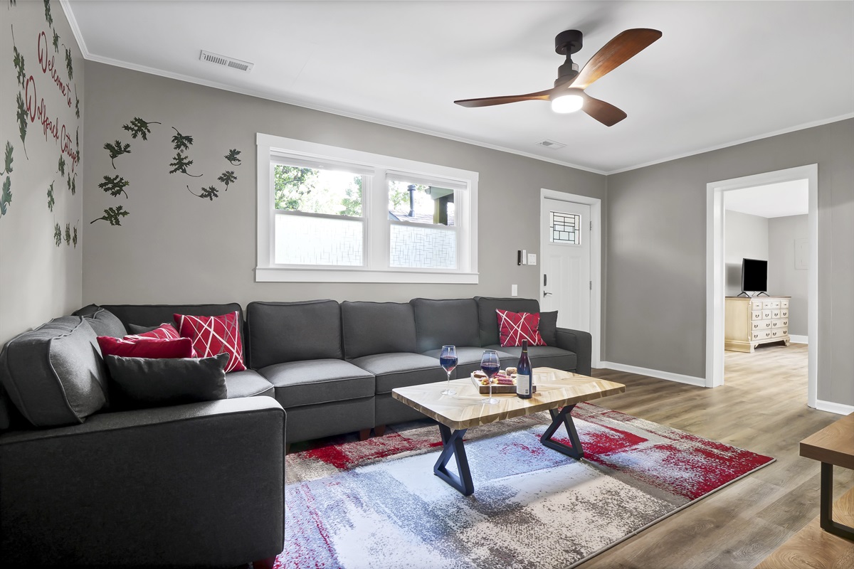 The expansive, plush sectional sofa offers the ideal gathering spot for family and friends.