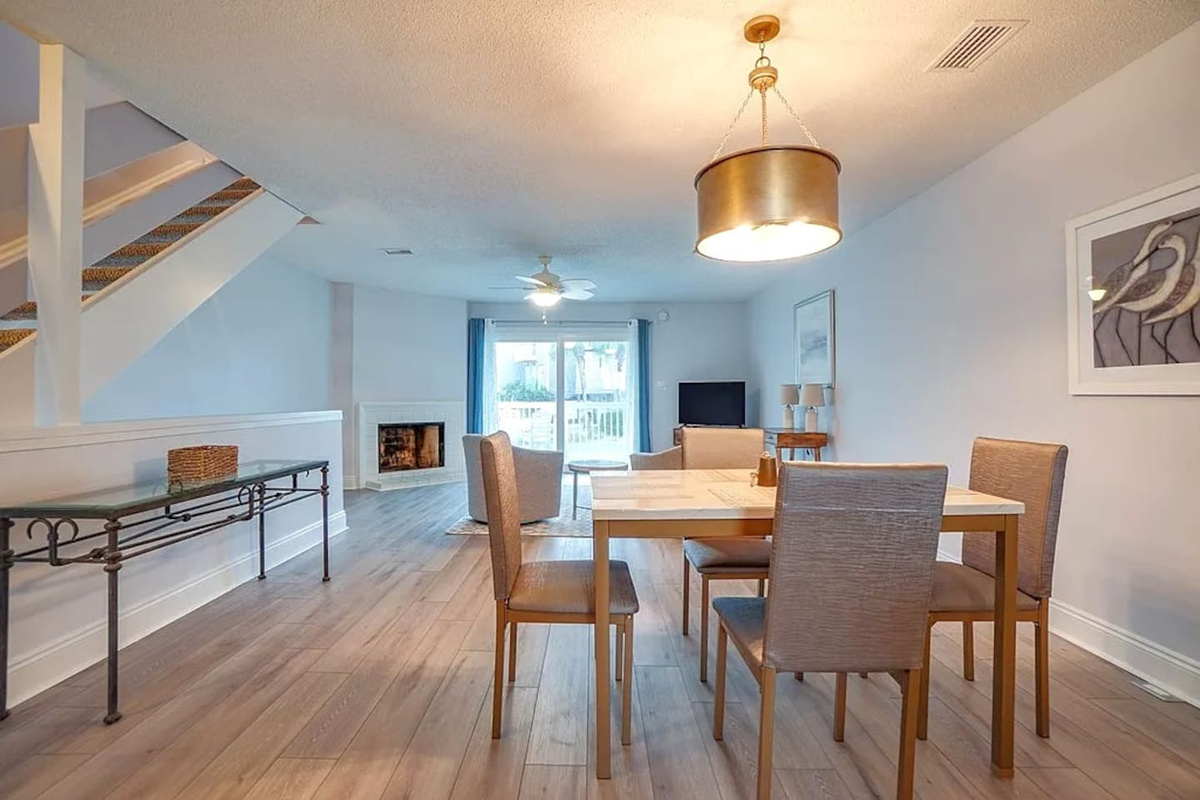 Open and connected, the main floor lets your whole group spread out &mdash; dining, living, and the Gulf-view deck all flow into one easy space.