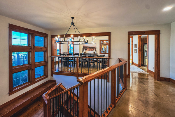 Main-floor hallway and staircase beside the dining room.
