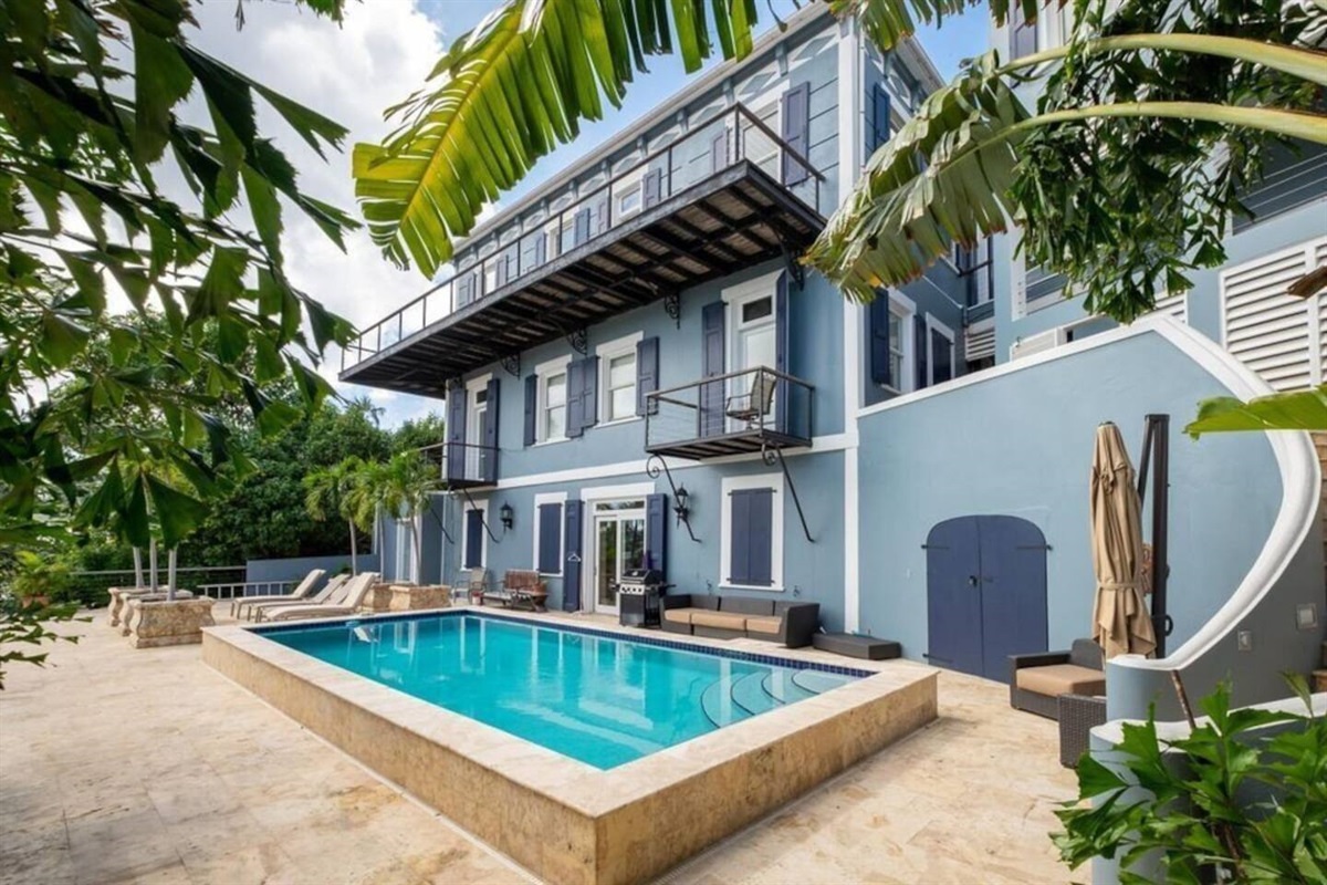 You have three, spacious floors, plus a wrap around deck, to spread out.