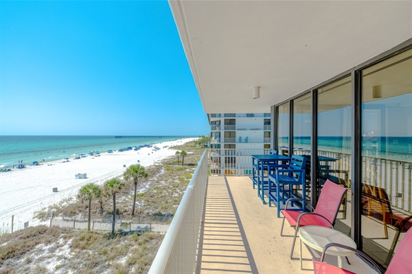 Wrap balcony with ample seating to soak up the view