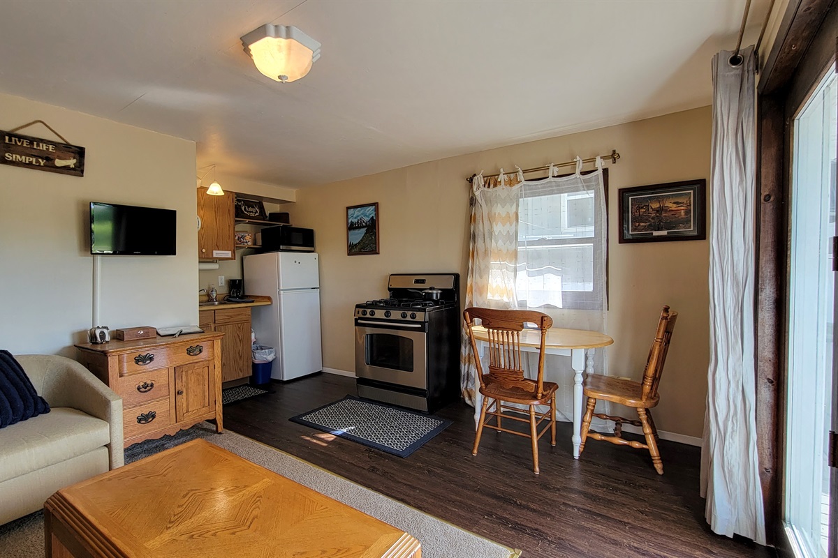 kitchen area and part of the living room - small and charming