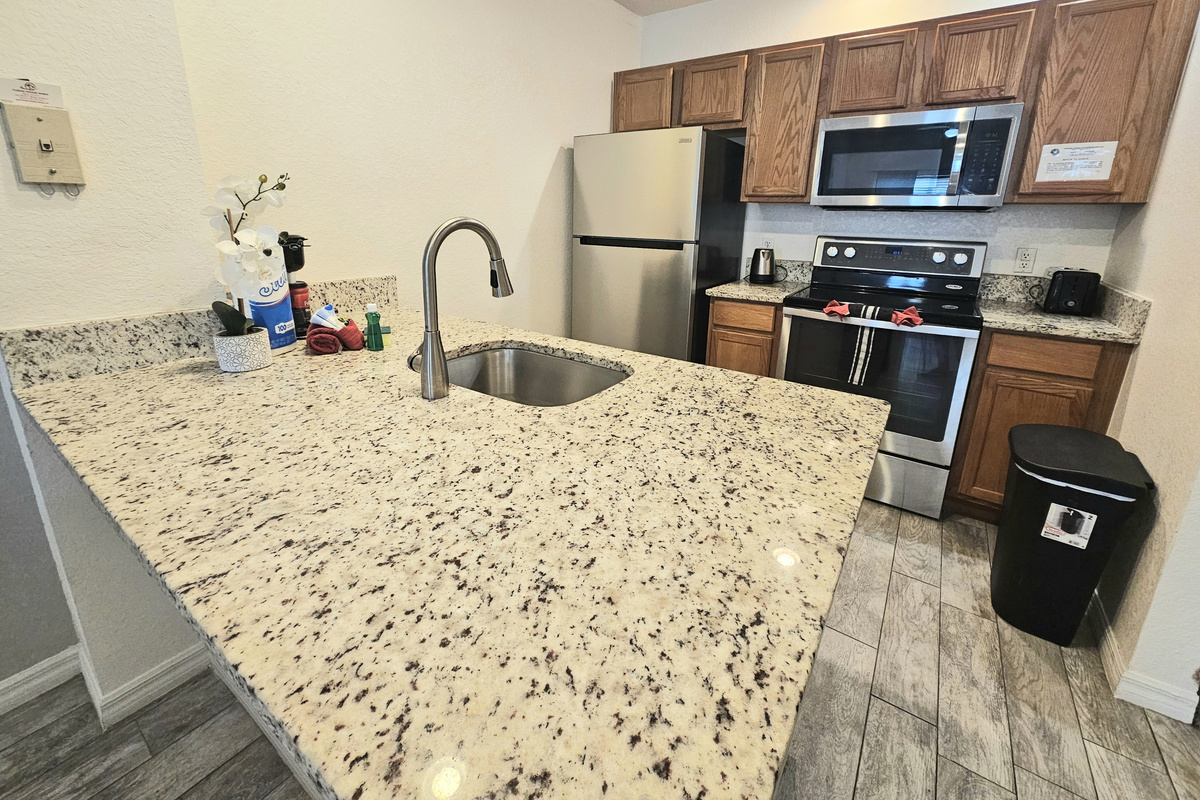 Fully Equipped Kitchen with Granite Counter Tops