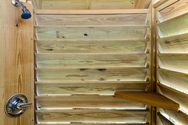 The outdoor shower is perfect to rinse off after the beach or before the pool. You'll love the hot and cold water!