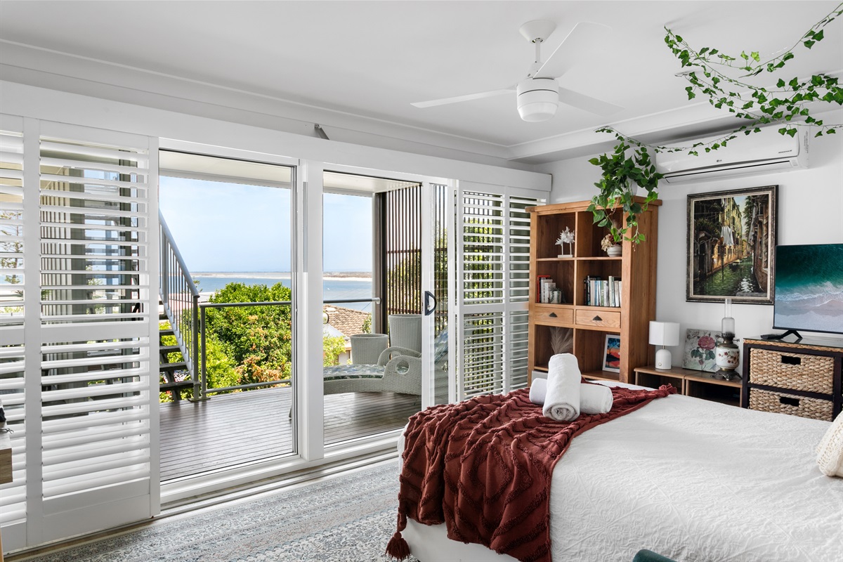 Will you choose this queen room with ocean views?