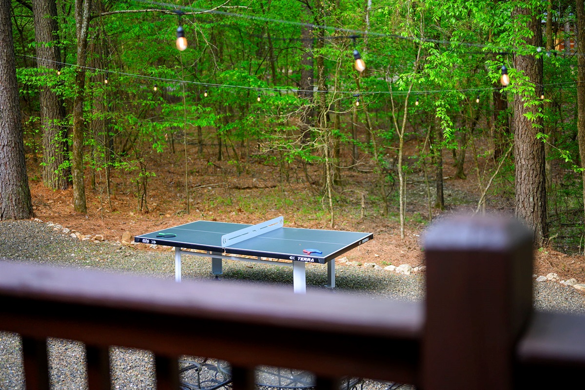 Outdoor ping pong table. Competition in the woods just hits different.