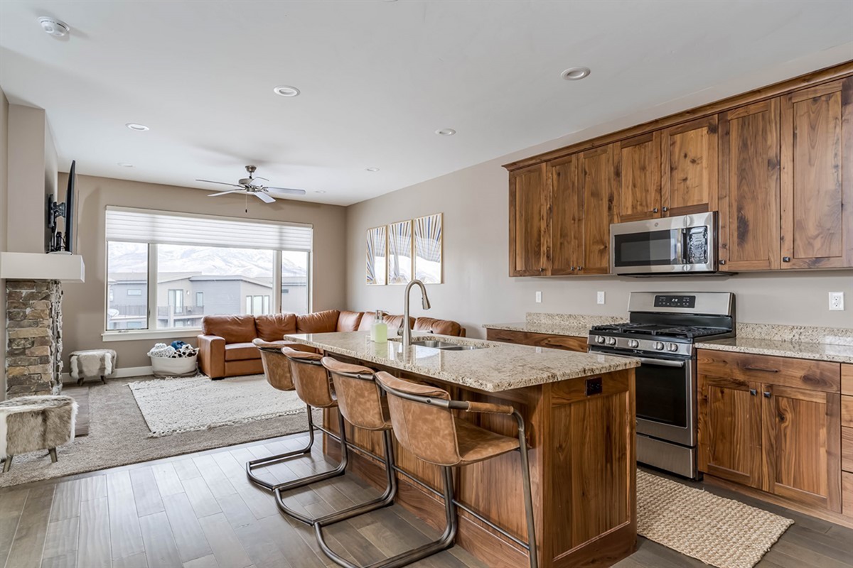Fully stocked kitchen with modern finishes and plenty of space to cook