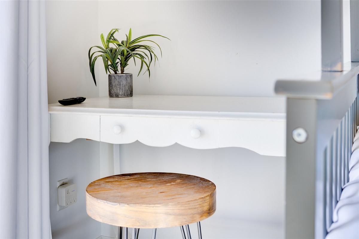 A sweet little desk area perfect for homework, drawing, or quiet time in Kid's bedroom