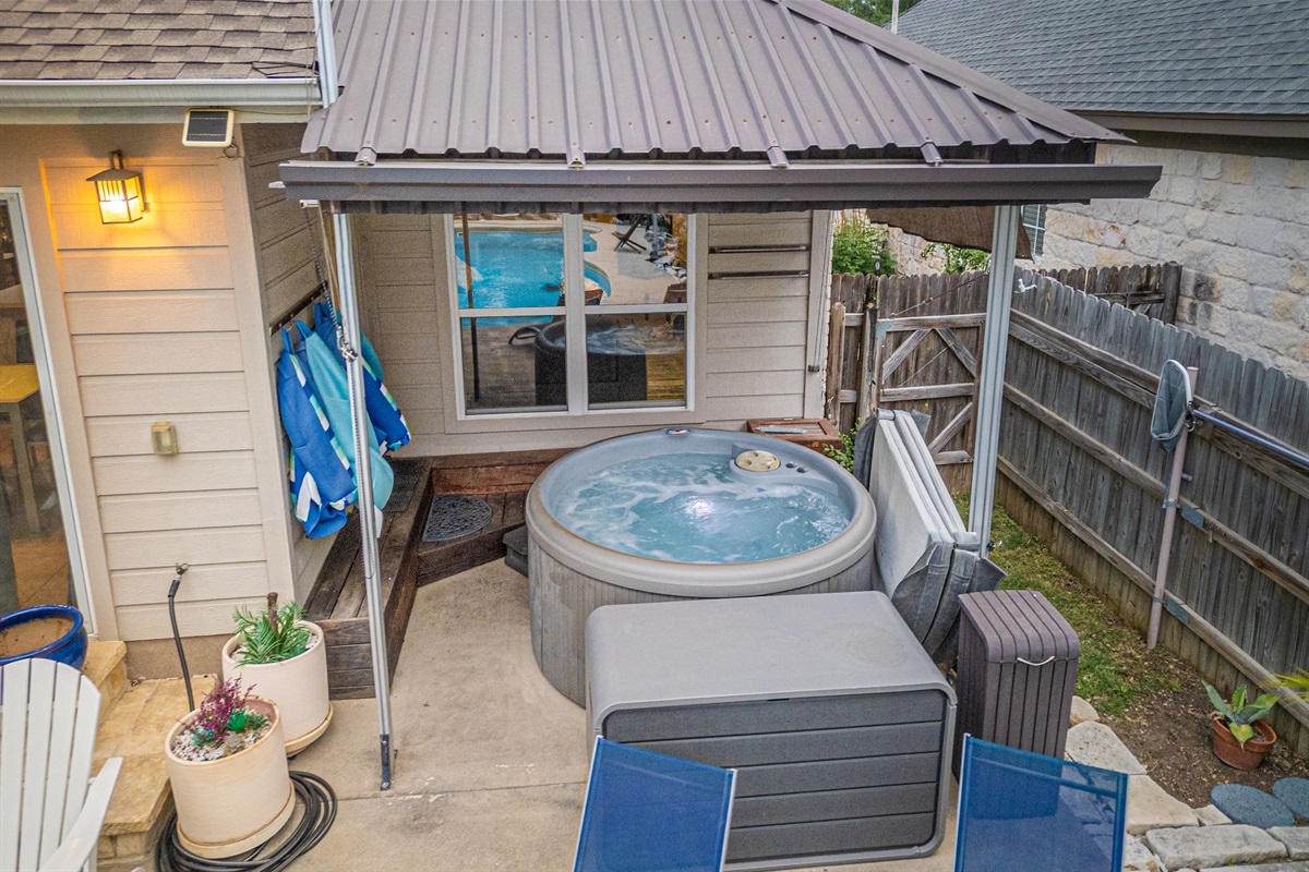 Hot tub area is covered so you may comfortable us in any weather. Totally private. Ceiling fan for use on hot summer nights Hot tub is clean, heated and ready for use all year round. Professionally maintained weekly.