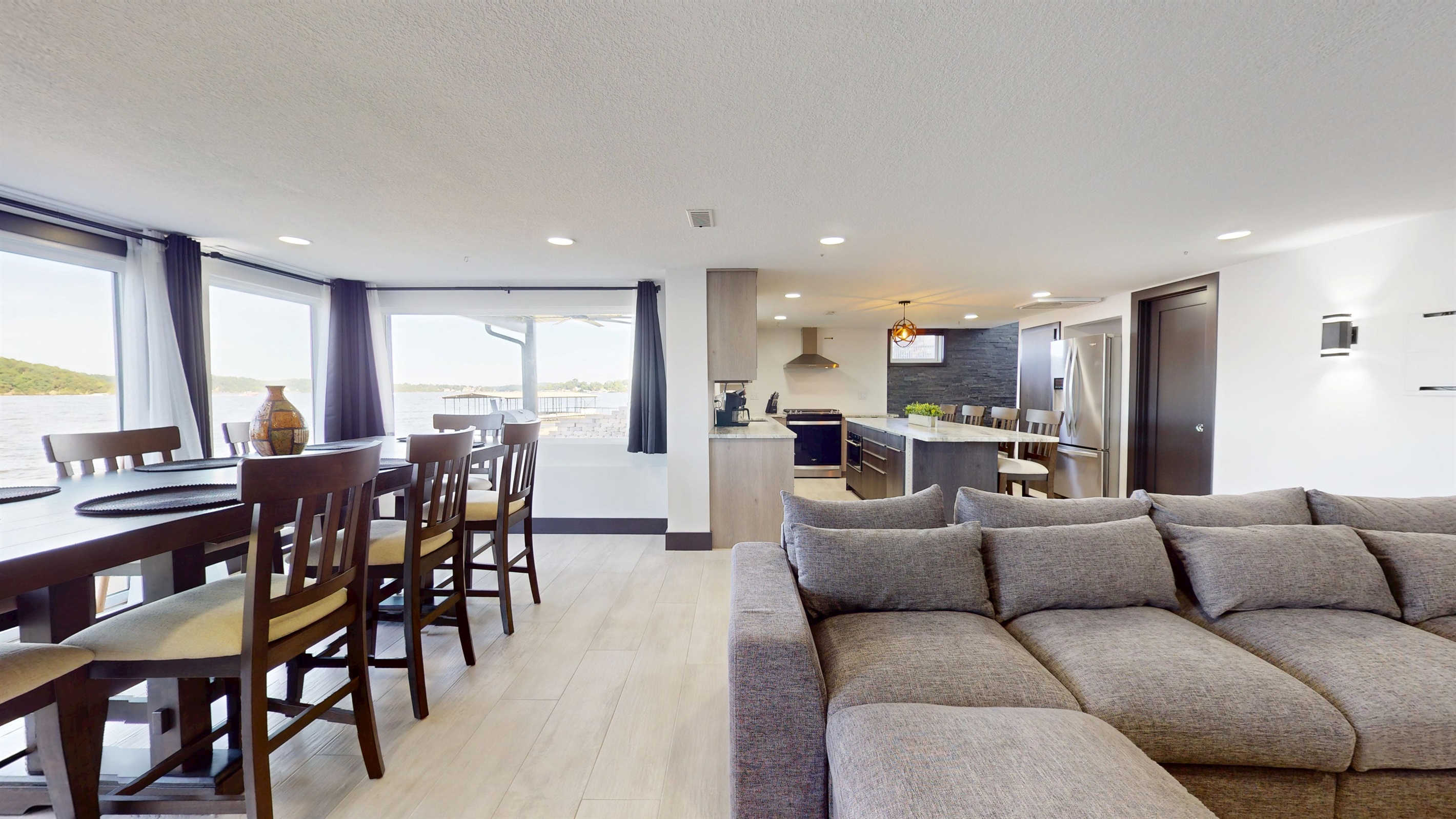 Lower level has large windows that let in lots of natural lighting as well as those Grand Views!