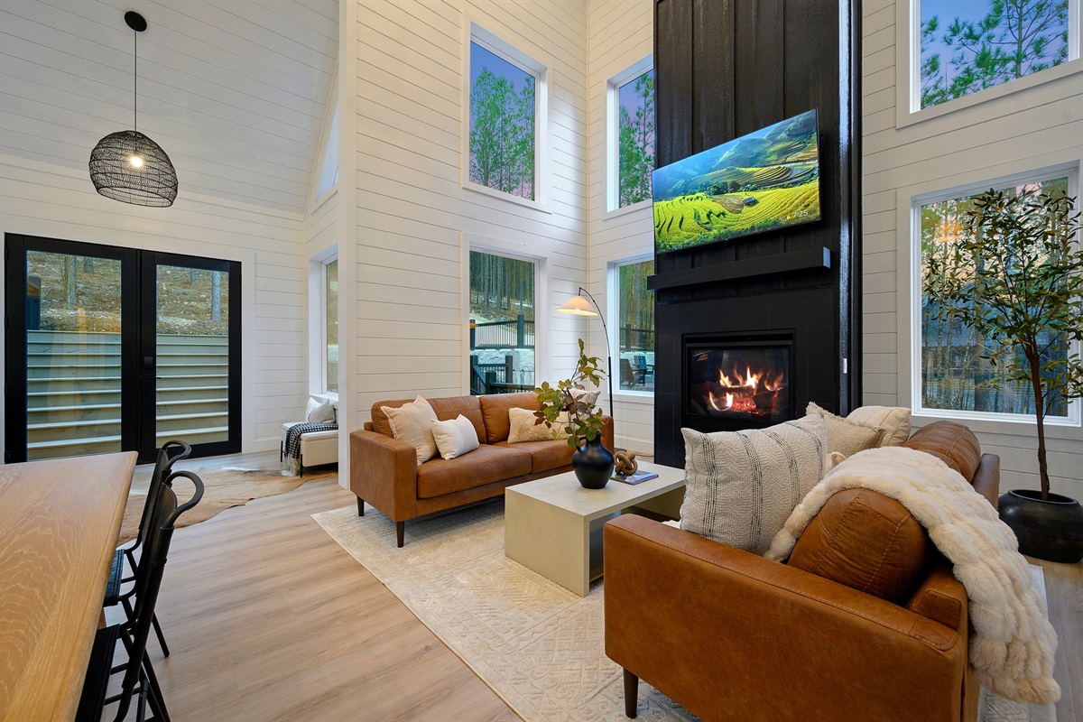 Gather around the sleek fireplace for cozy evenings with a fire and your favorite movie.
