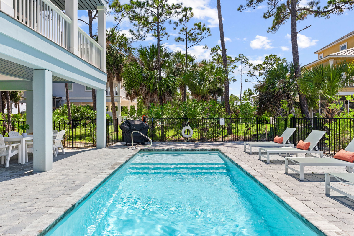 The private pool features a large tanning ledge - perfect for soaking up the sun while the kids splash and play nearby.