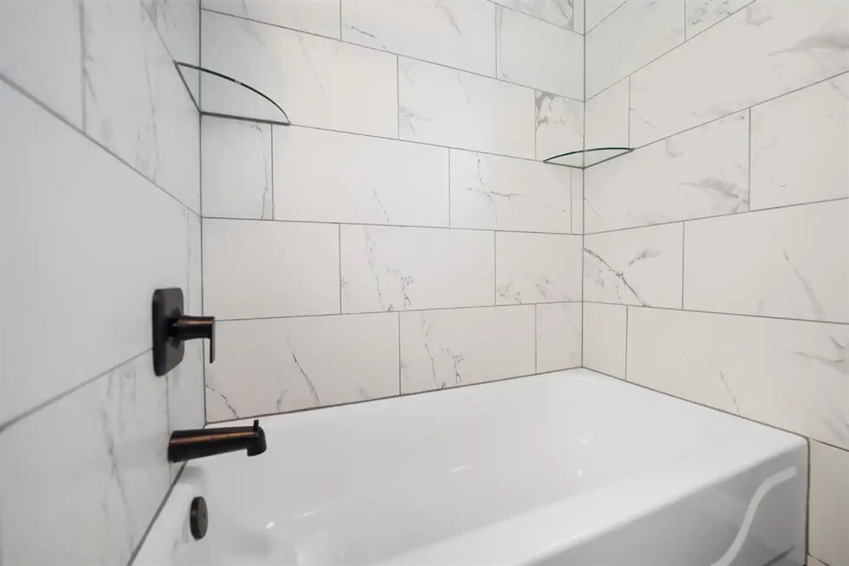 The second-floor full bathroom offers a tub/shower combo.