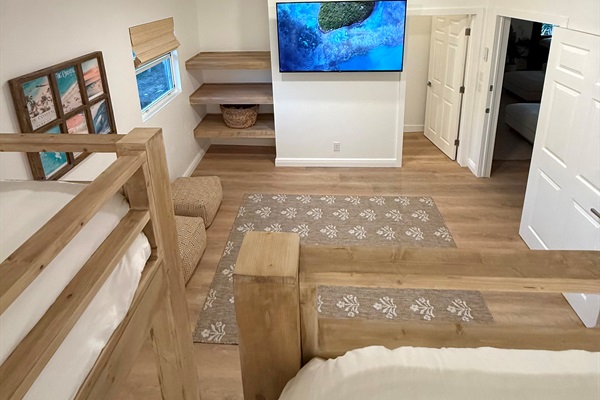 Overview of the grand scale bunk room with its own en suite bathroom