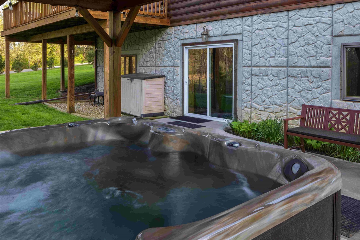 Relax in the hot tub whenever you would like! Sliding door is the inside access from the lower level.