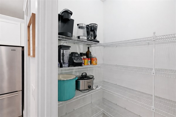 Pantry is stocked with additional appliances for your use.
