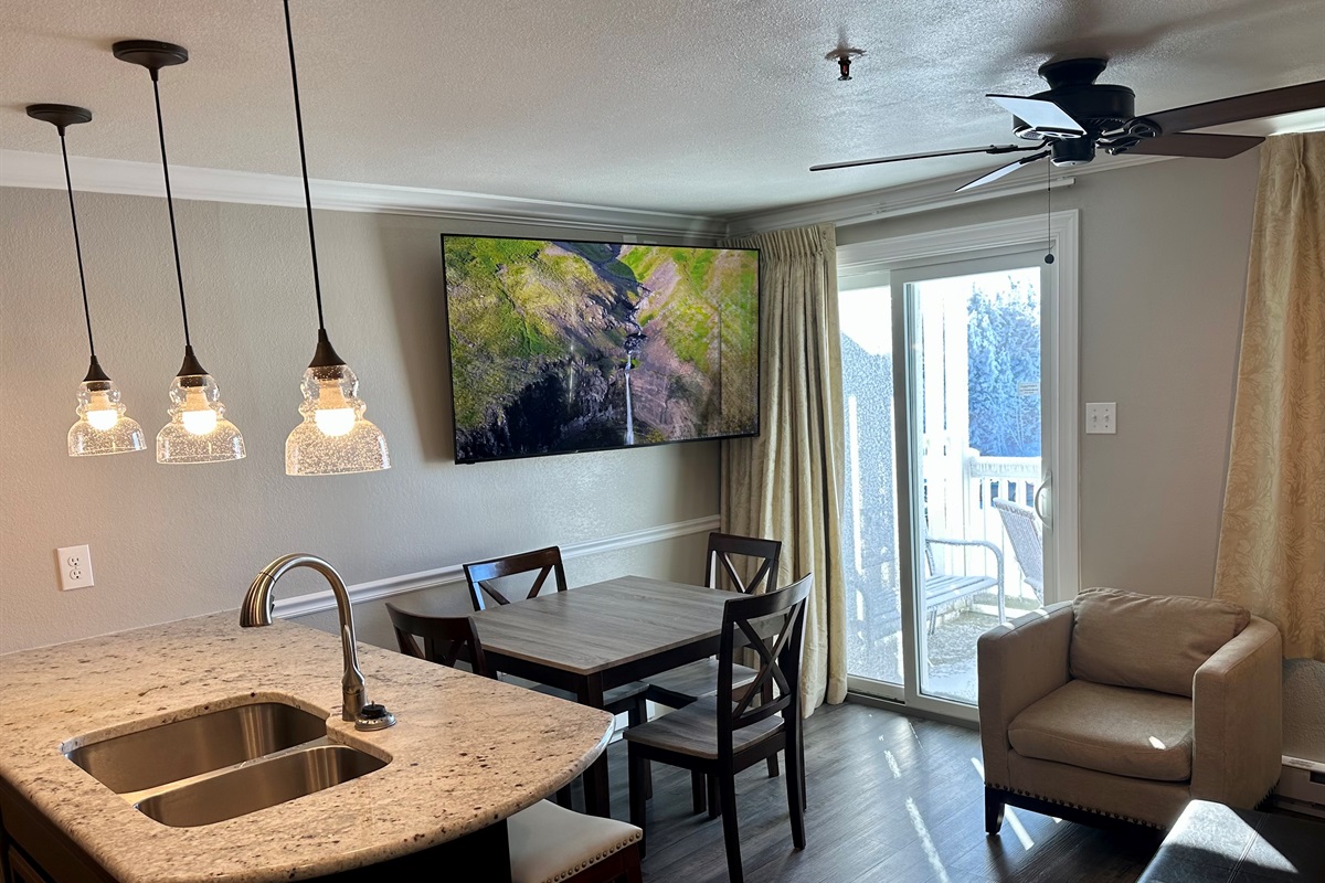 65" Smart TV with full cable lineup and Showtime movie channels.