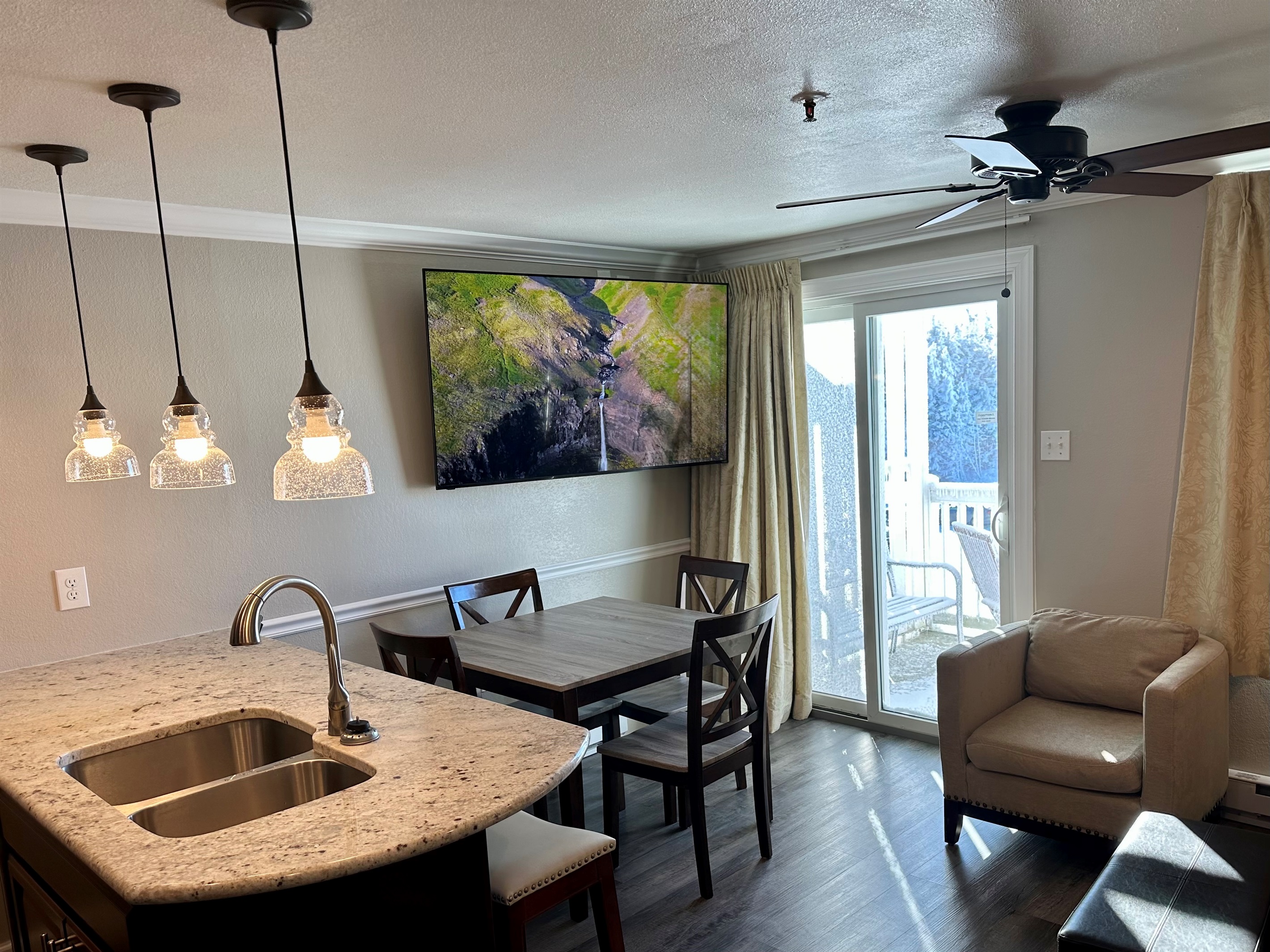 65" Smart TV with full cable lineup and Showtime movie channels.