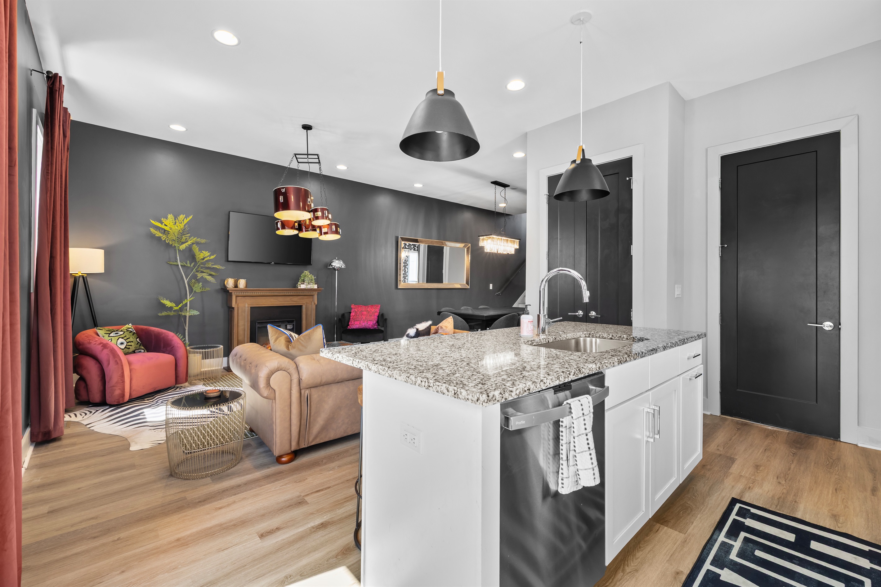 Living Room: Stylish blend of modern decor and vibrant accents, perfect for relaxation and fun!