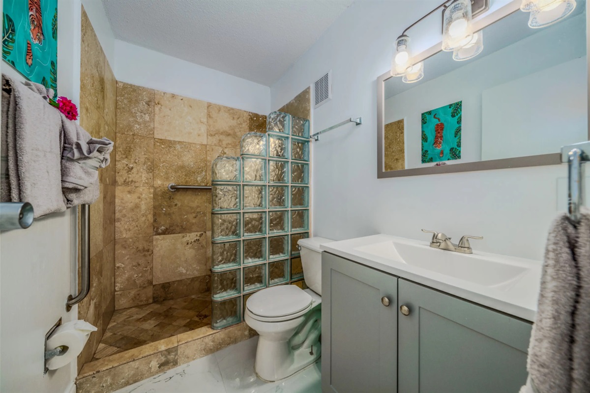 Clean and updated full bathroom with everything you need for a comfortable stay.