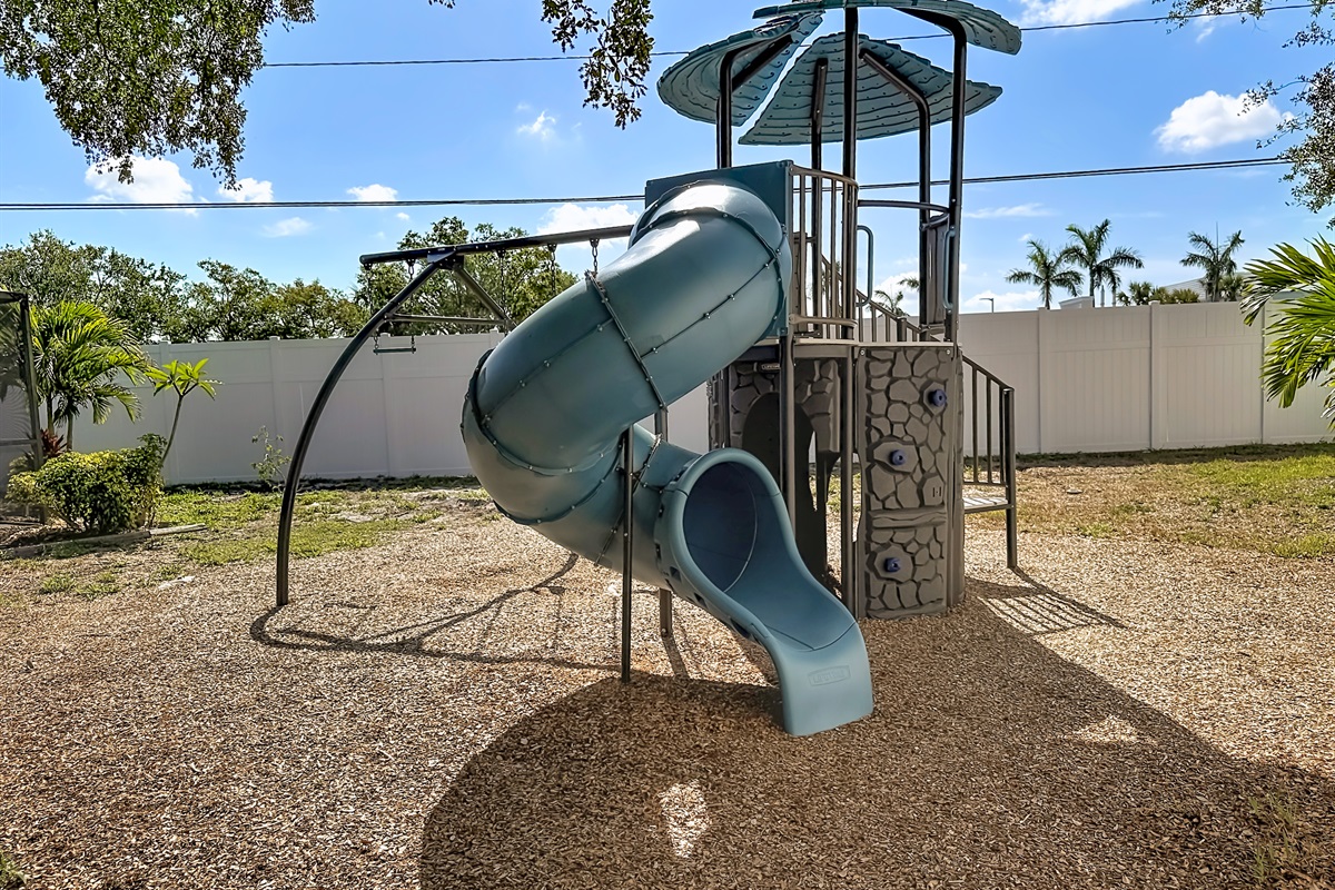 Our backyard even has a fun playset, to keep your little ones entertained. 