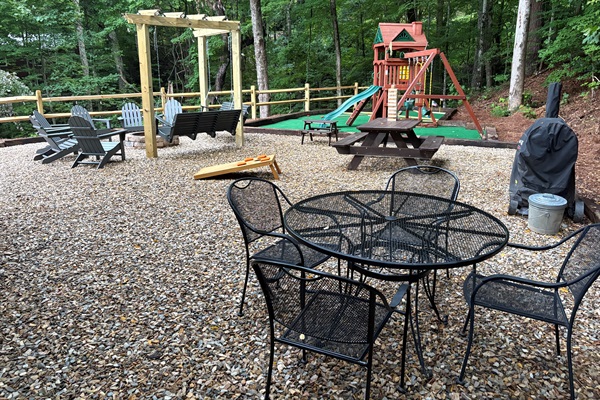 Outdoor Space with Multiple Dining Tables, Charcoal Grill & Cornhole